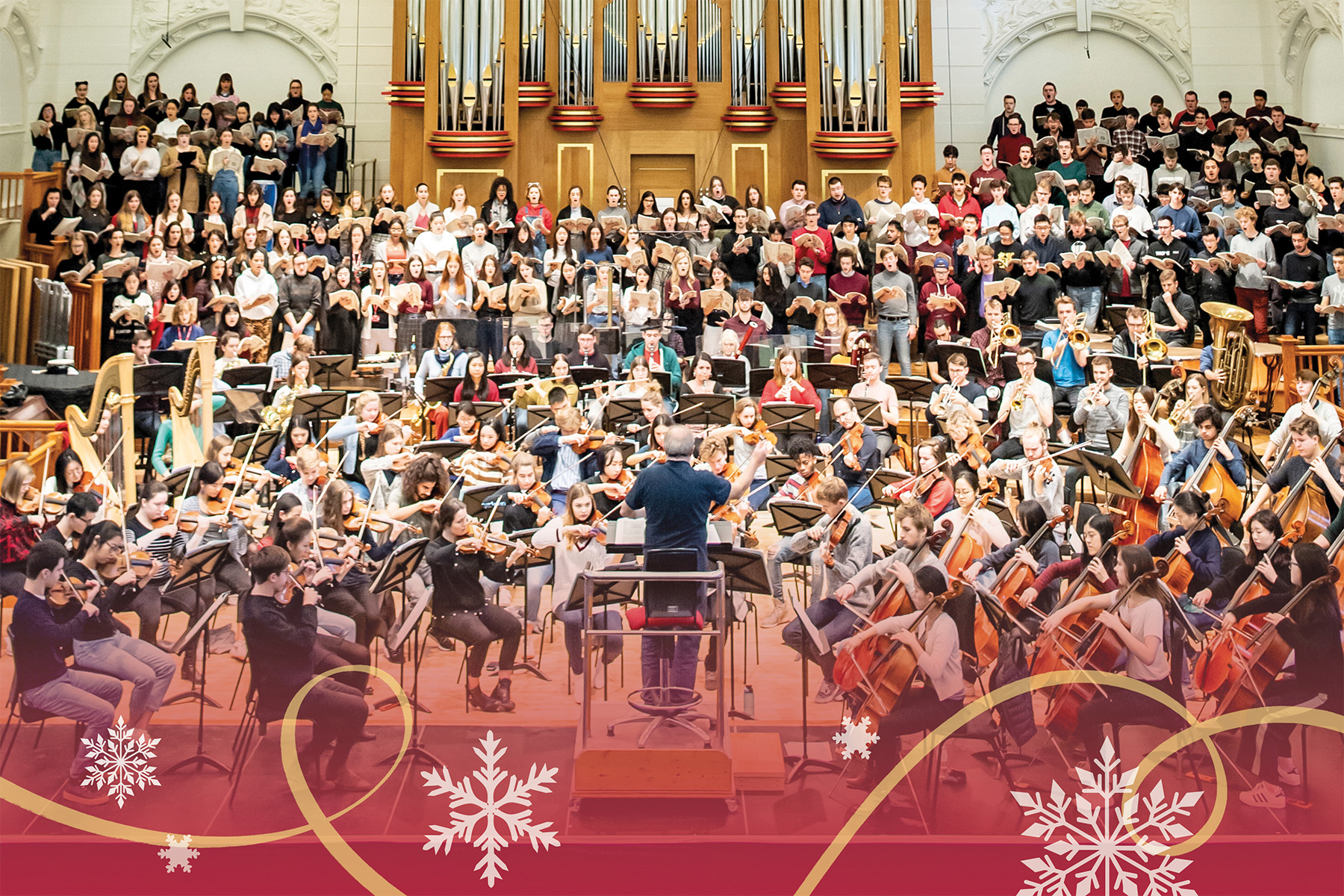 Snowflakes surrounding students in an orchestral rehearsal in the RCM's Amaryllis Fleming Concert Hall